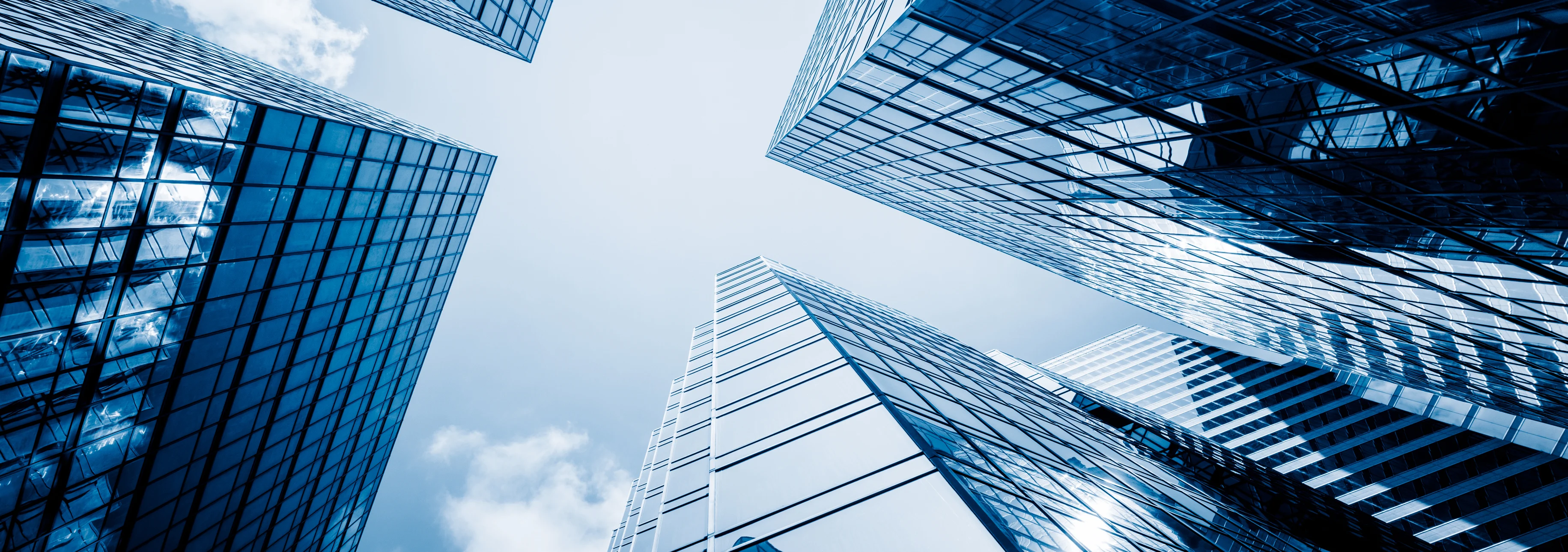 Tall glass buildings from the ground