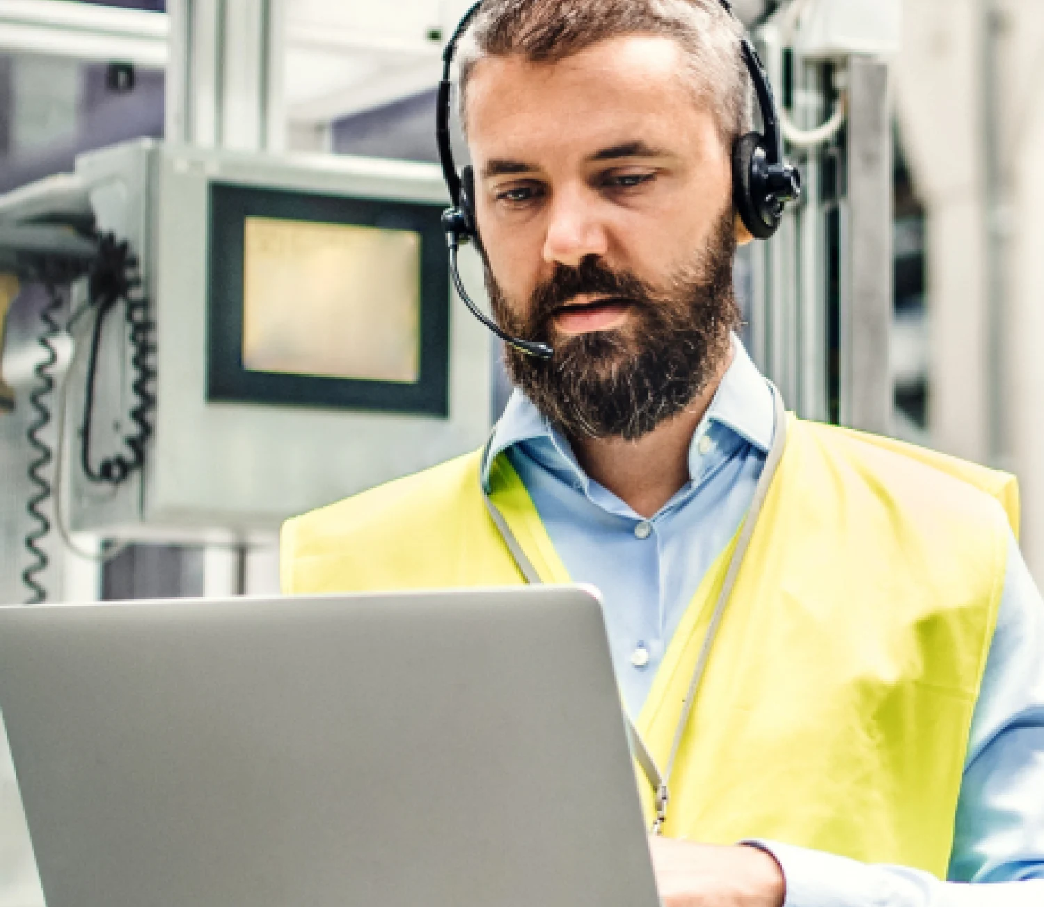 Man with headphones and a computer