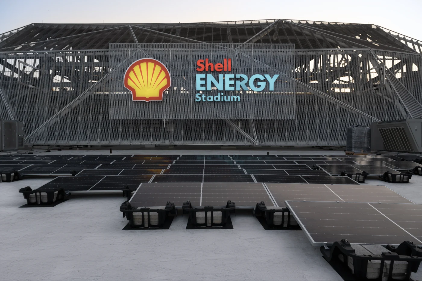 Solar pannels on the ground ready to be installed in the Shell Energy Stadium