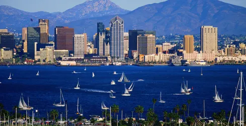 the city of San Diego with the mountains behind